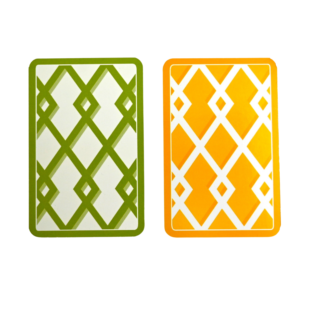 A twin pack of playing cards with contrasting trellis patterns in green and yellow.
