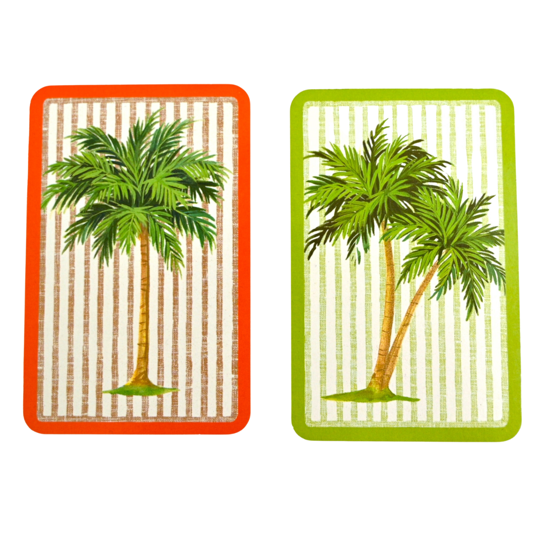 playing cards with palm tree motif and striped background in red and green