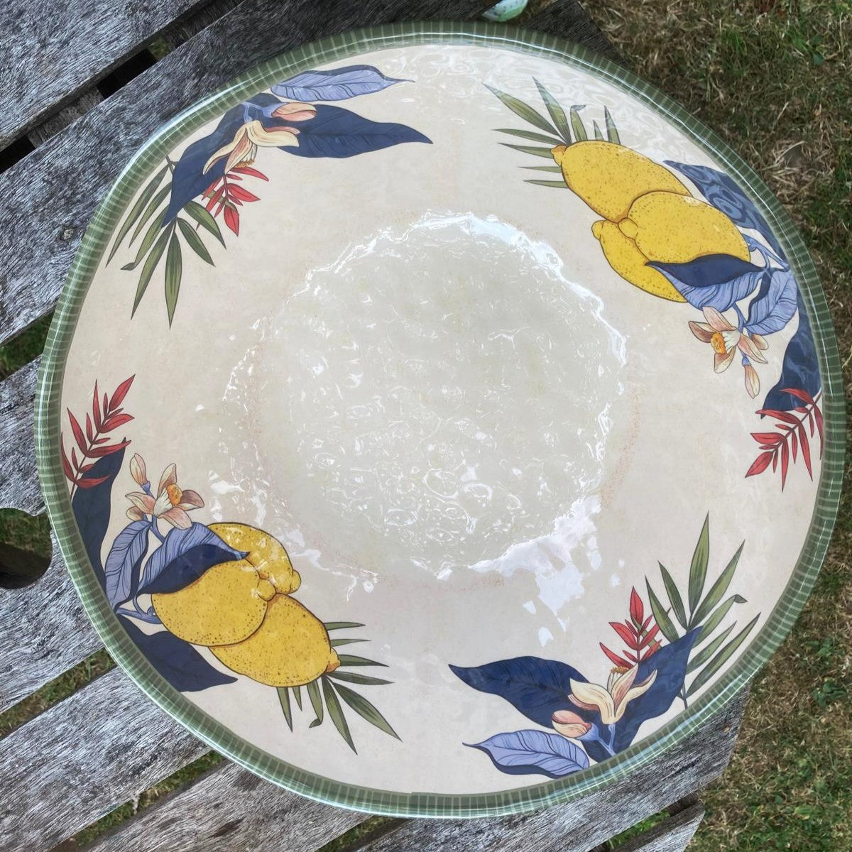 melamine salad bowl in lemons design outside on table