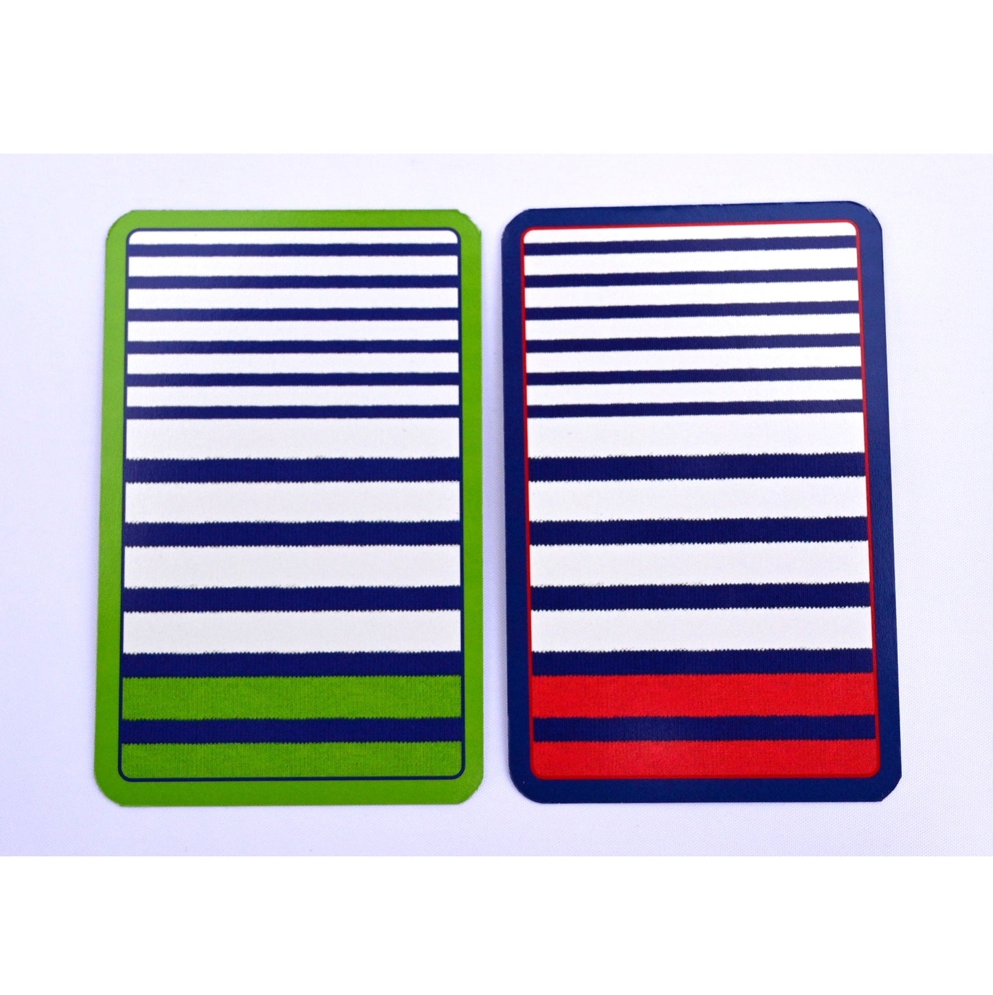 A twin pack of playing cards with contrasting stripe patterns in green, red, and blue colors.
