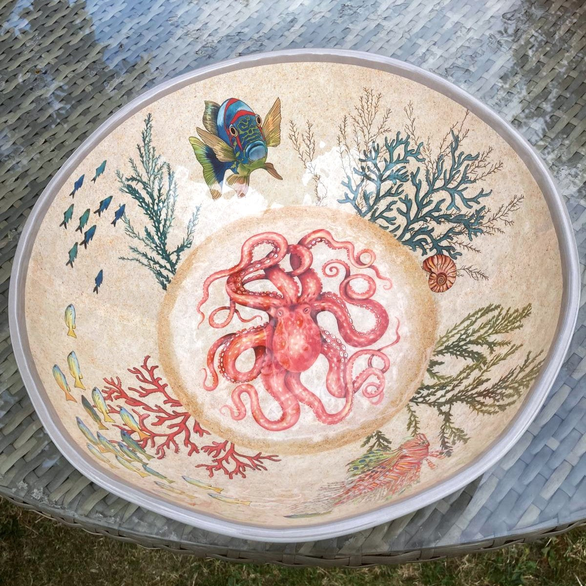 sealife design salad bowl on table outside different angle