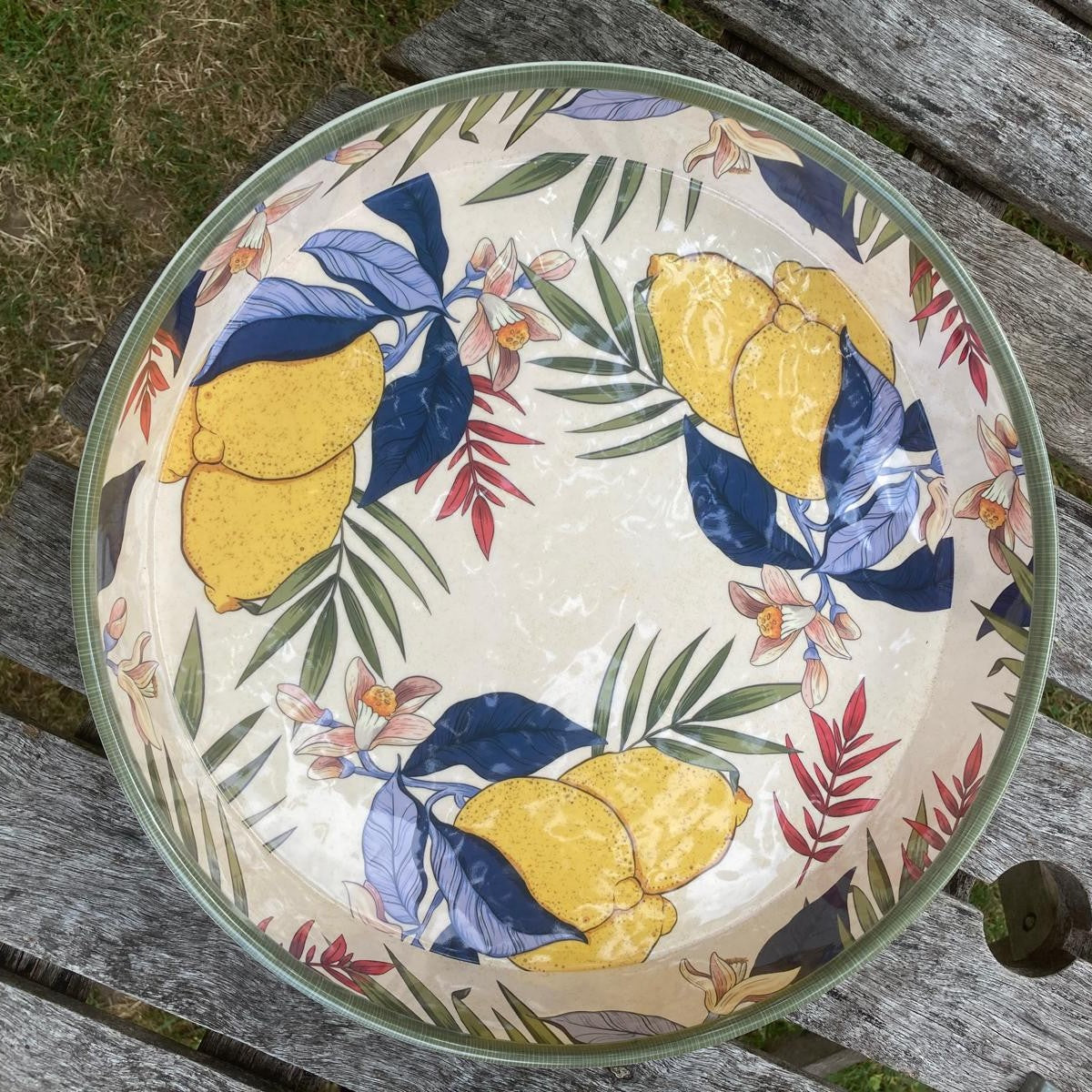 melamine tray in lemons designed pictured on a wooden table