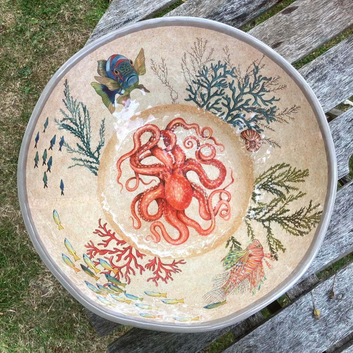 sealife design salad bowl on table outside